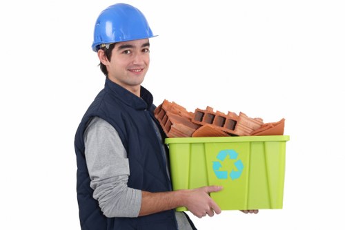 Professional waste clearance truck at a building site